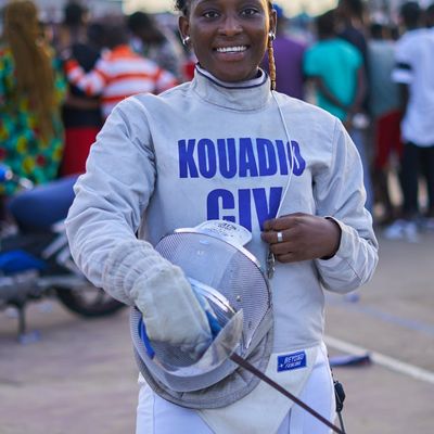 Professional fitness practitioner smiling in sports gear